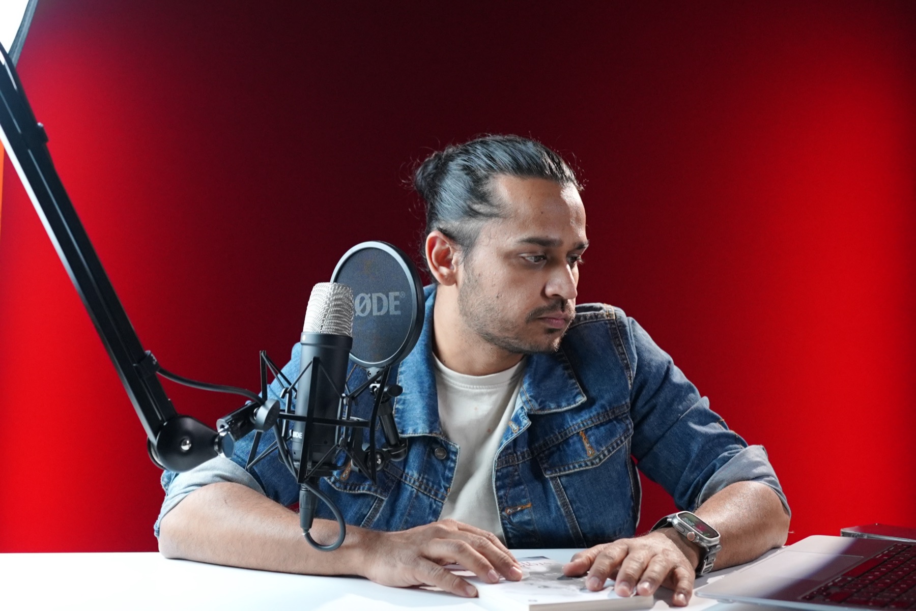 Yasir Rizvi hosting the Xto10X podcast in the studio